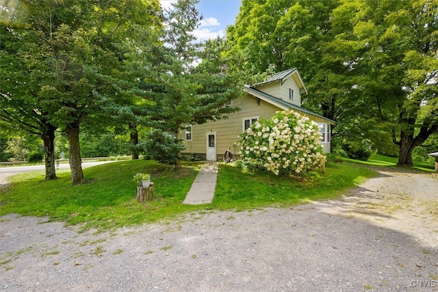 view of front of home with a front yard