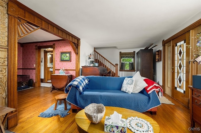 living room featuring hardwood / wood-style flooring and a fireplace