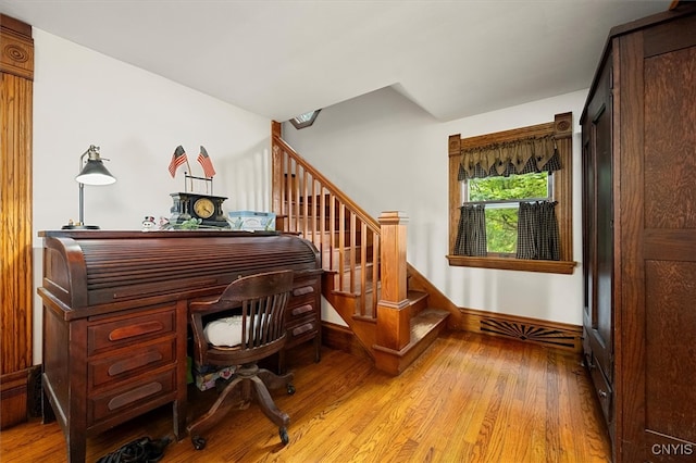 office space with light hardwood / wood-style floors