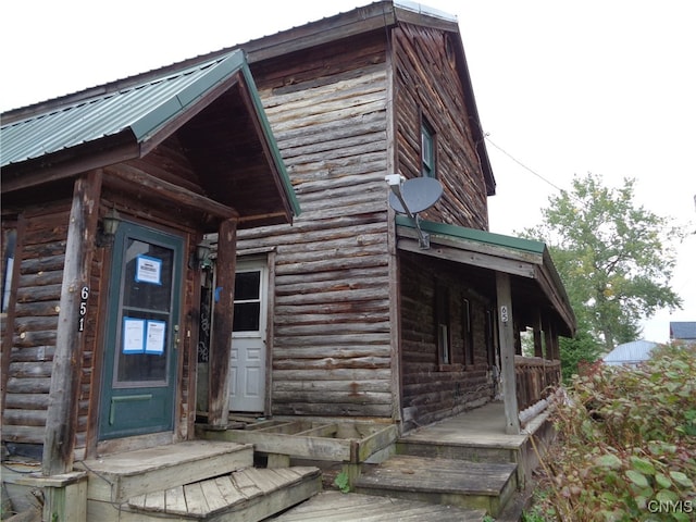 exterior space featuring covered porch