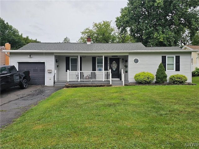 single story home with a garage, a porch, and a front lawn