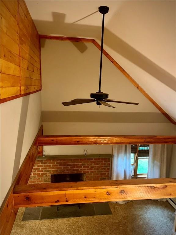 interior details featuring carpet flooring and ceiling fan