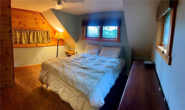 bedroom with hardwood / wood-style floors