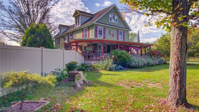 view of front of property with a front lawn and a porch