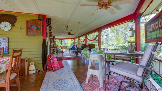 exterior space with ceiling fan