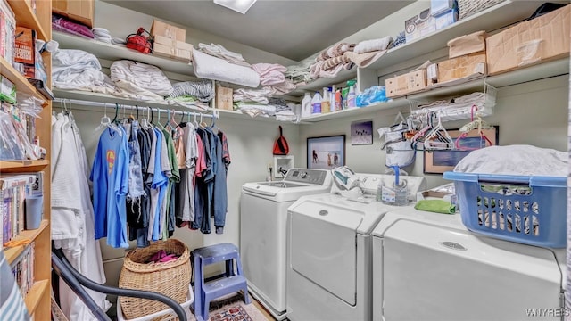 laundry room featuring washer and clothes dryer