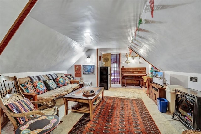 living room with carpet floors and vaulted ceiling