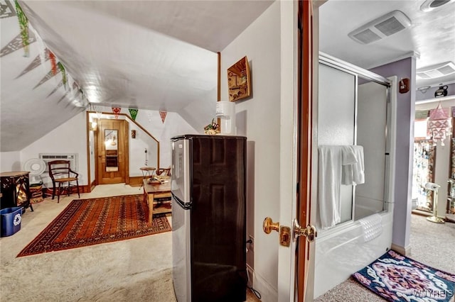 bathroom featuring vaulted ceiling