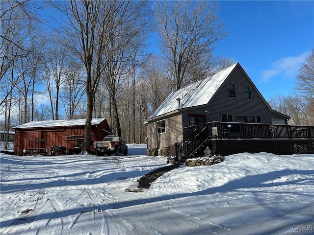 exterior space featuring a wooden deck