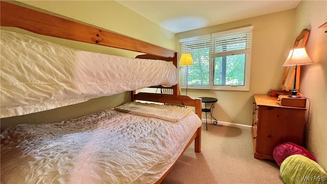 bedroom featuring carpet