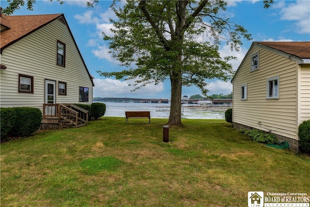 view of yard with a water view