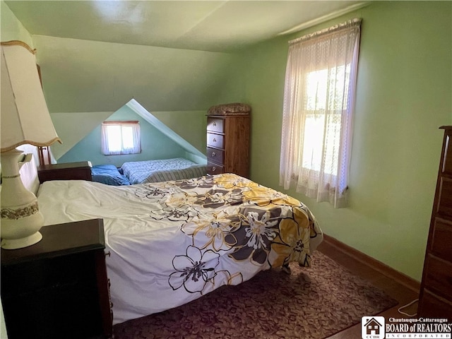 bedroom with vaulted ceiling