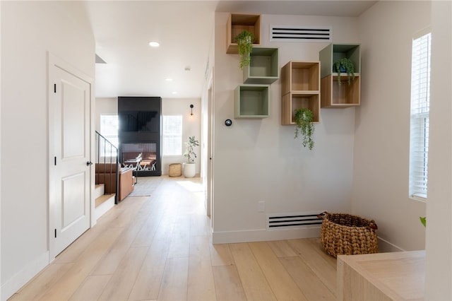 hallway featuring light hardwood / wood-style flooring