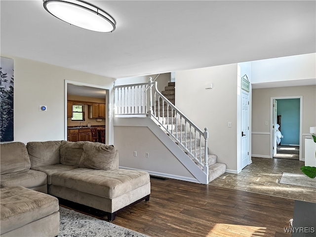 living room with dark hardwood / wood-style flooring