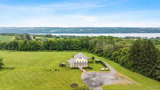 drone / aerial view featuring a water view and a rural view