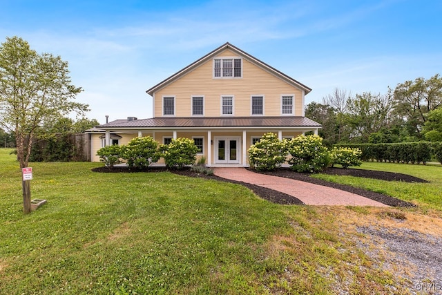 country-style home with a front yard