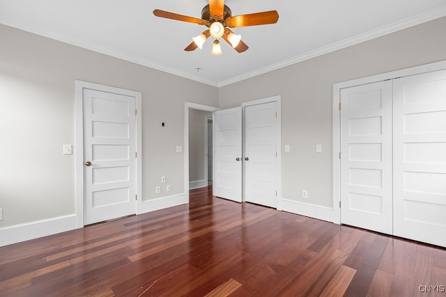 unfurnished bedroom featuring ceiling fan, dark hardwood / wood-style floors, and ornamental molding