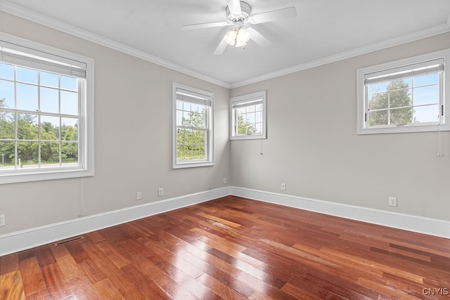 unfurnished room featuring crown molding, wood-type flooring, and ceiling fan