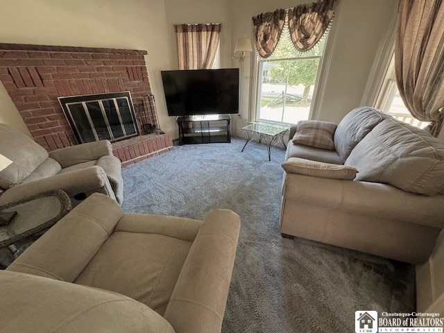 carpeted living room featuring a fireplace