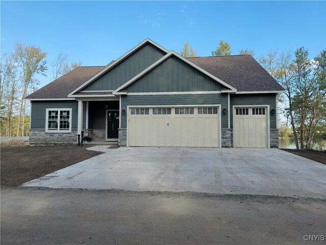 craftsman house with a garage