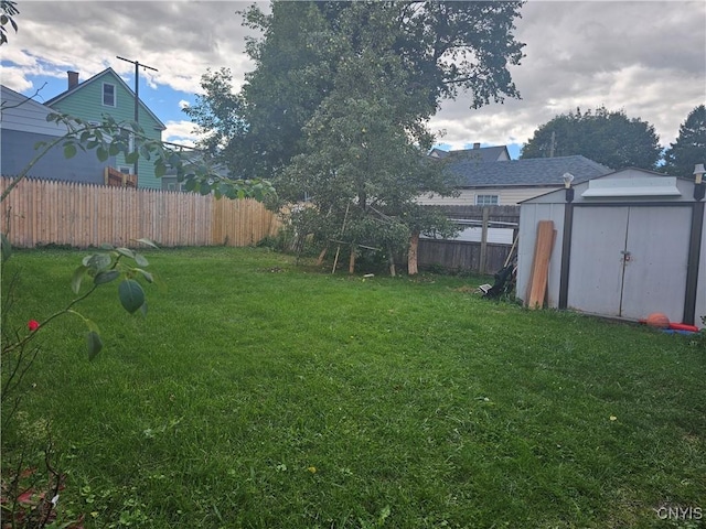 750 Lansing St, Utica, NY 13501 - view of yard with an outbuilding, a shed, and fence