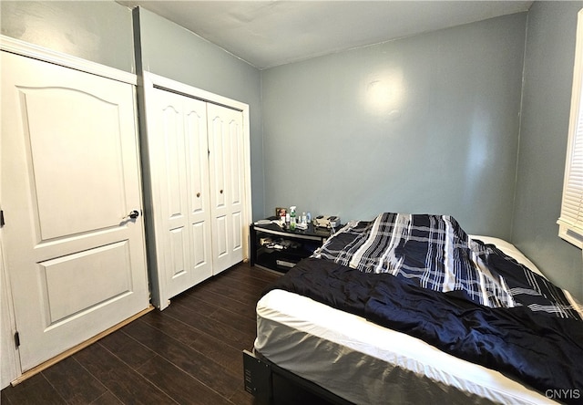 bedroom featuring dark hardwood / wood-style floors