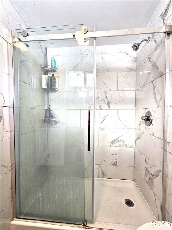 bathroom featuring walk in shower