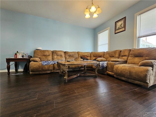 750 Lansing St, Utica, NY 13501 - living room featuring dark wood finished floors and a chandelier