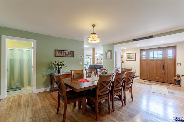 dining room featuring light hardwood / wood-style flooring