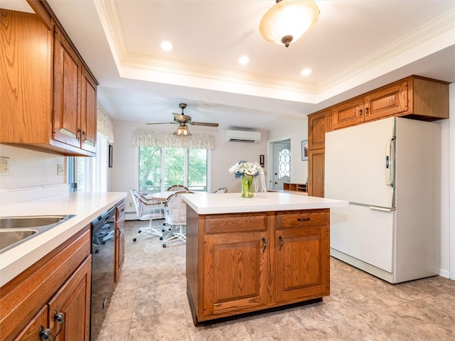 kitchen featuring white refrigerator, a tray ceiling, an AC wall unit, and ceiling fan