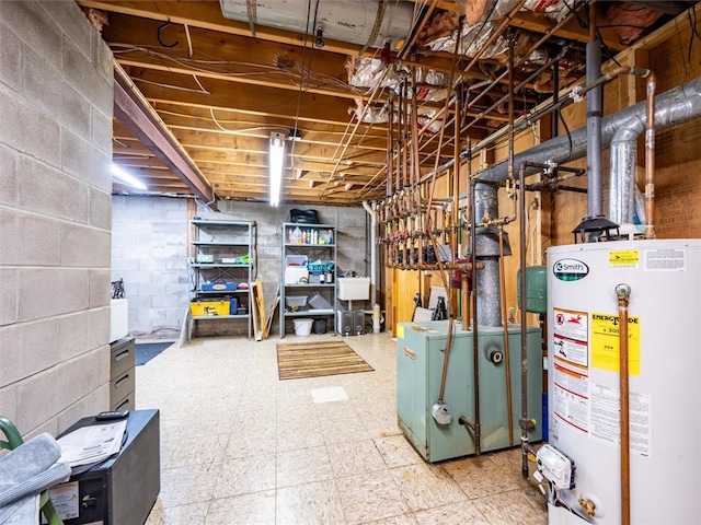 basement featuring gas water heater and sink