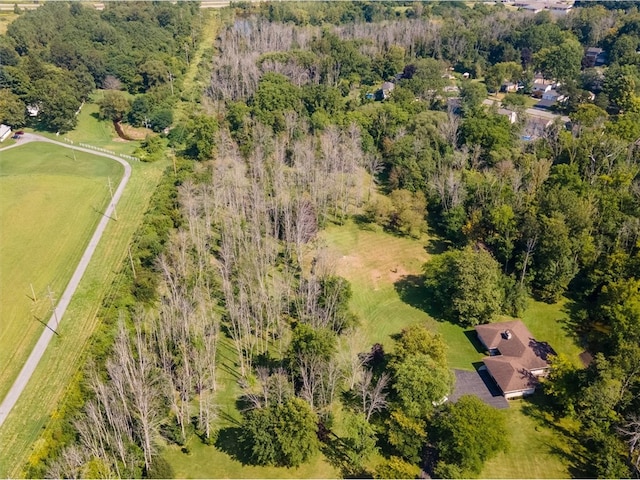 birds eye view of property with a rural view