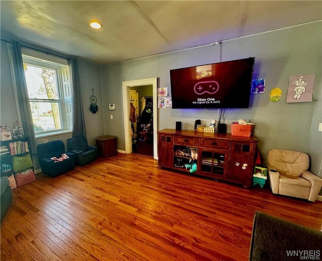 game room with hardwood / wood-style flooring