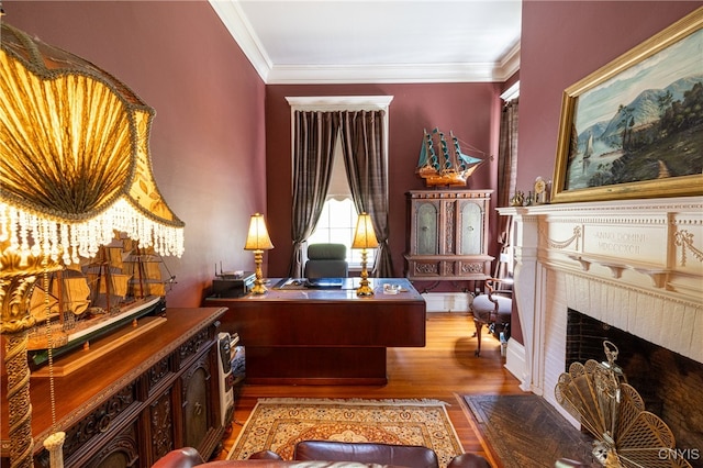 office featuring hardwood / wood-style floors and ornamental molding