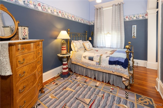 bedroom featuring hardwood / wood-style floors