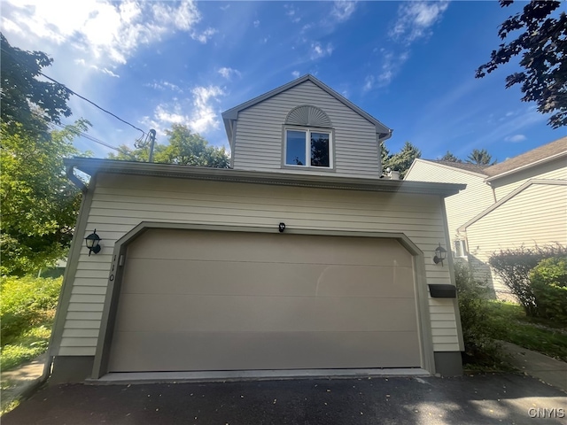 view of home's exterior featuring a garage