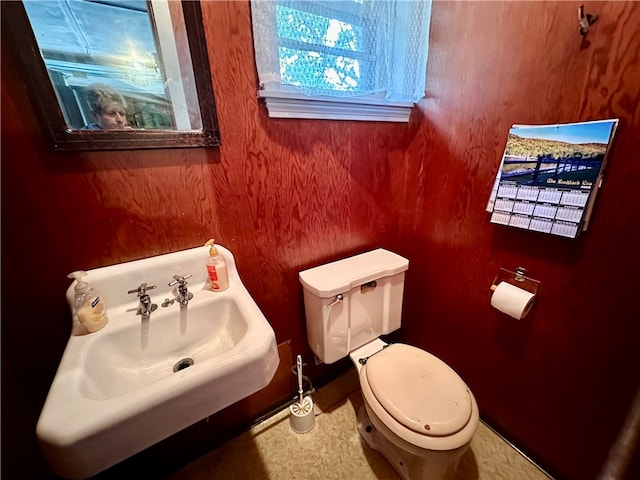 bathroom with sink and toilet