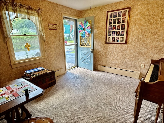 entryway featuring carpet flooring and a baseboard radiator