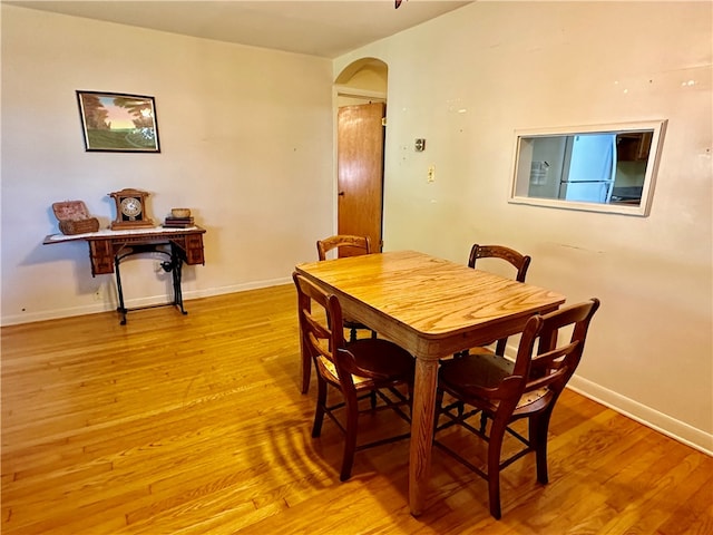 dining room featuring light hardwood / wood-style floors