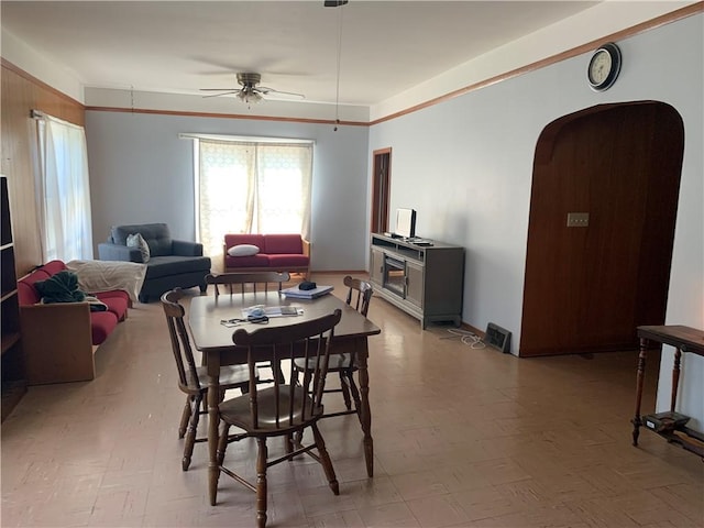 452 Main, Independence, NY 14897 - dining room with a ceiling fan, arched walkways, and light flooring