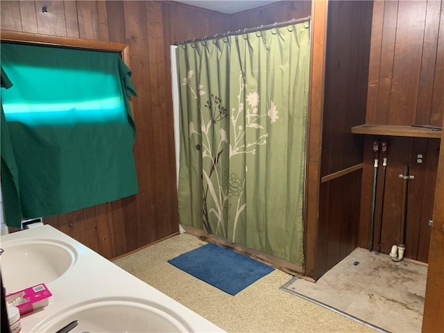 452 Main, Independence, NY 14897 - bathroom featuring wood walls, double vanity, and curtained shower