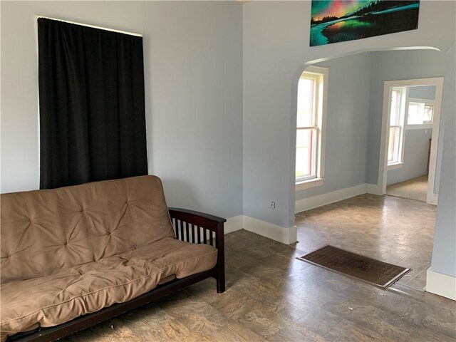 sitting room with a healthy amount of sunlight