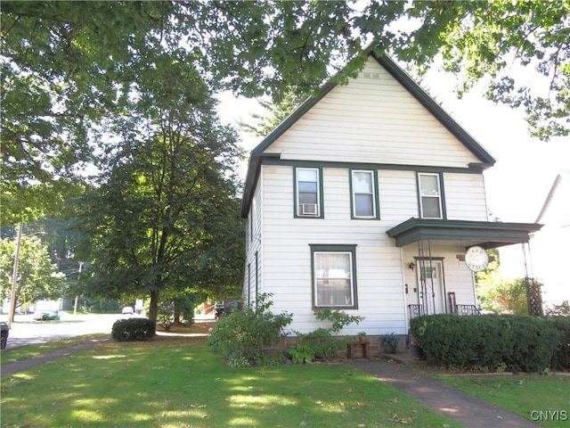 view of front of home with a front lawn