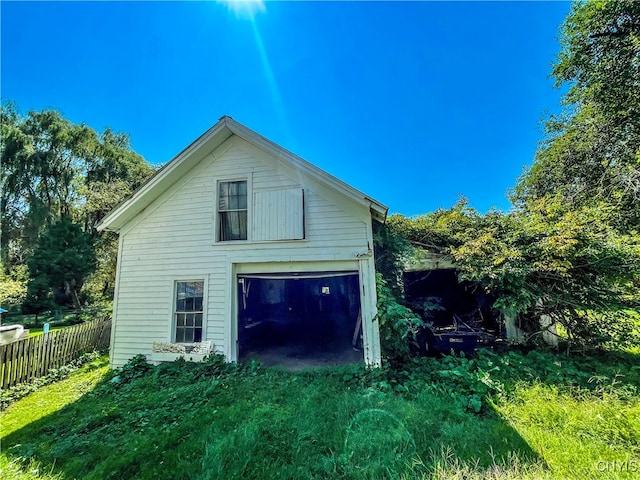 view of home's exterior with a lawn