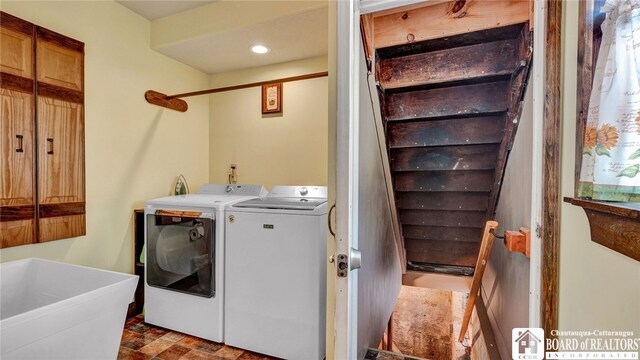 laundry room featuring independent washer and dryer and sink