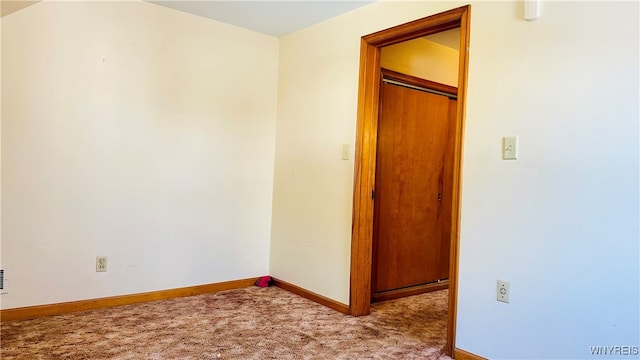 view of carpeted spare room