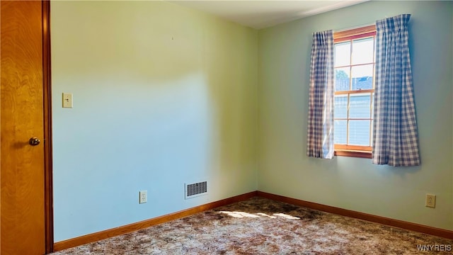 view of carpeted spare room