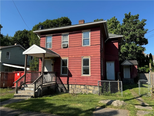 view of front of home with a front yard