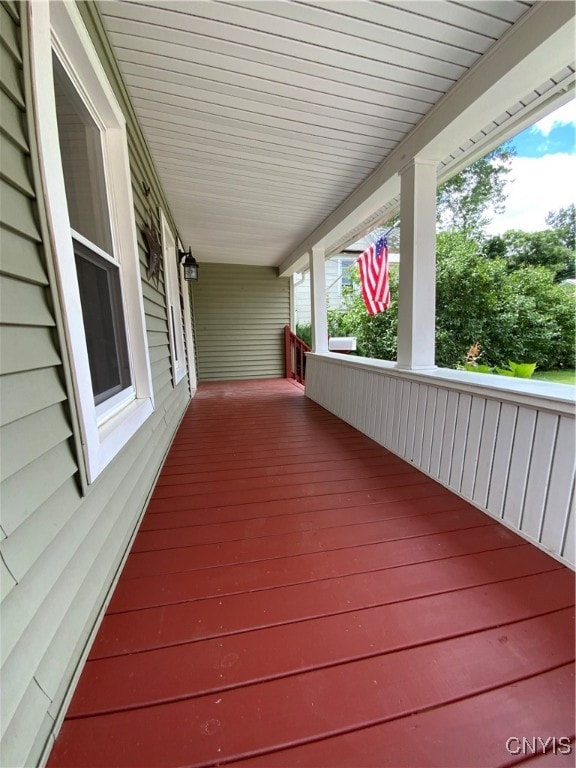 wooden terrace with covered porch