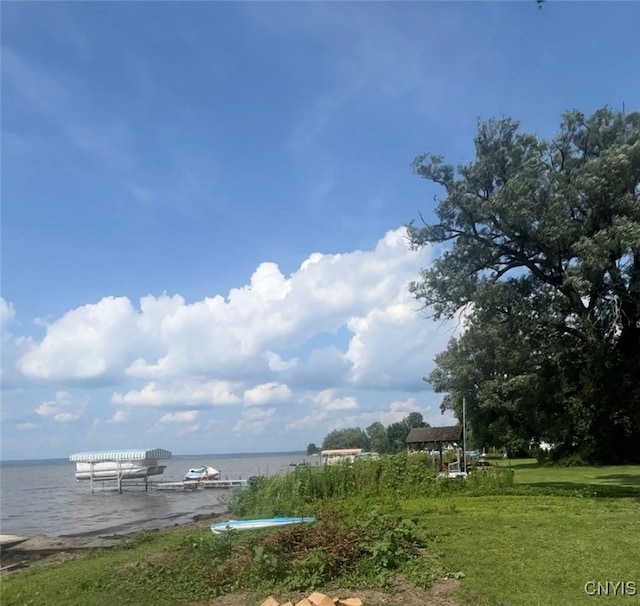 exterior space with a water view